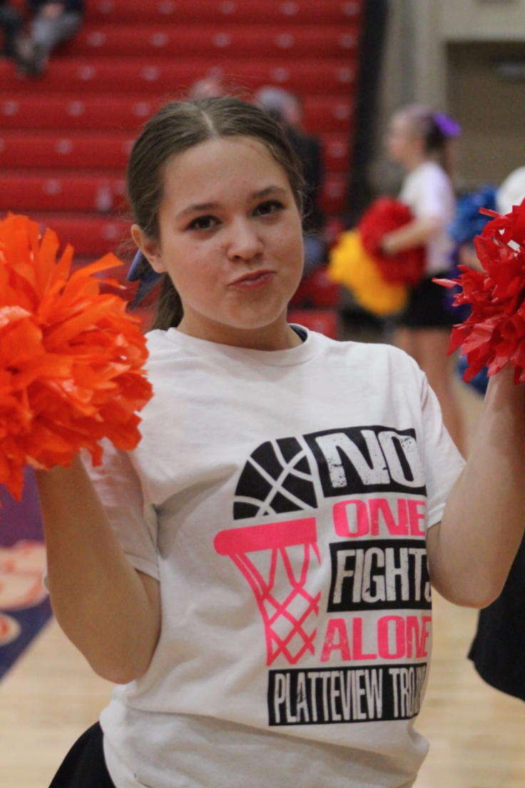 Millianne Burns (9) stops and poses for a photo while getting ready to stunt.